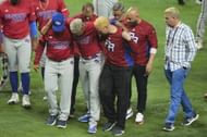 Diaz was helped off the field by teammates